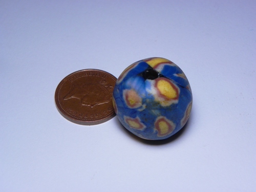 bead_and_1p_coin.jpg (68.5 KB)